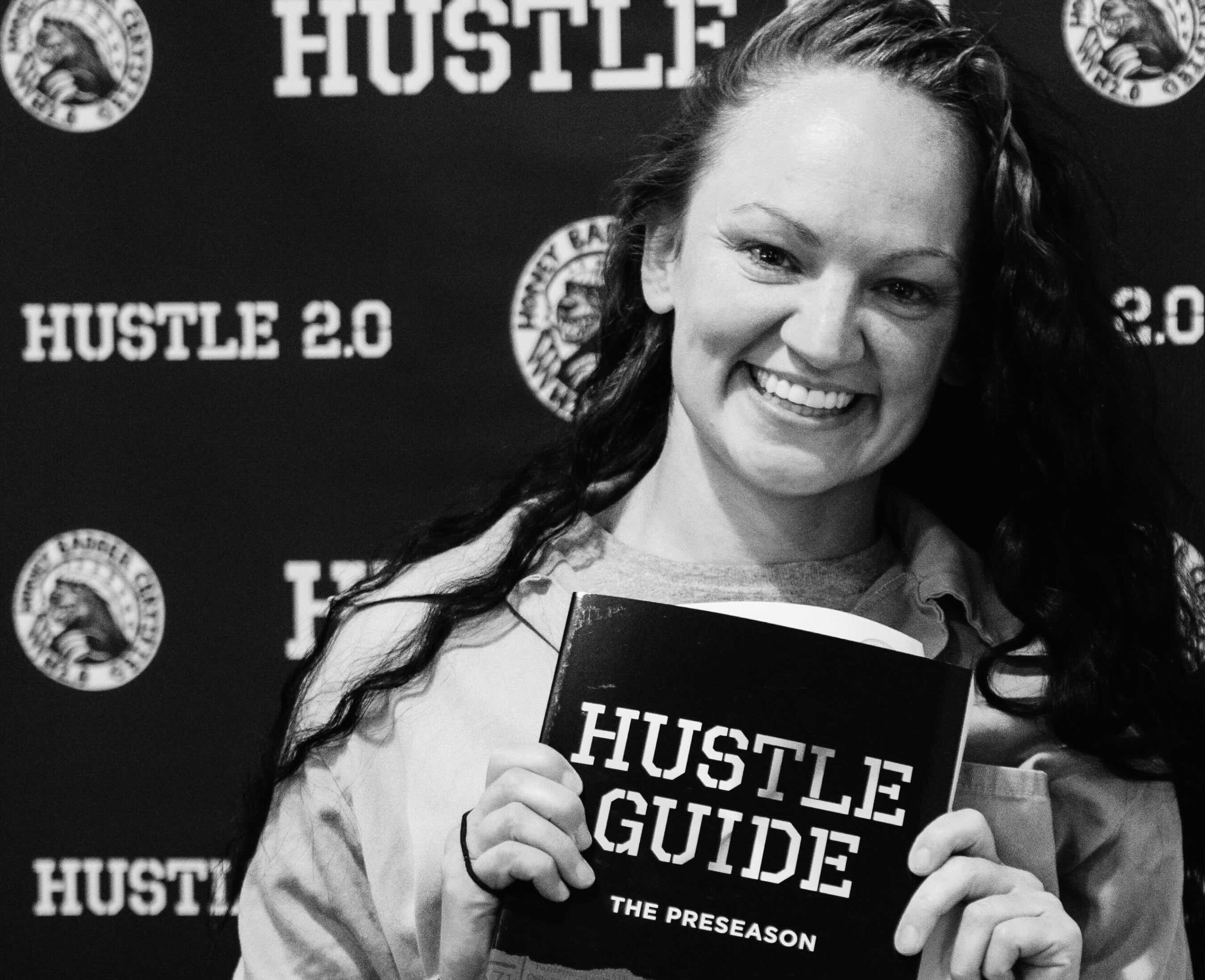 Hustle Guide female graduate